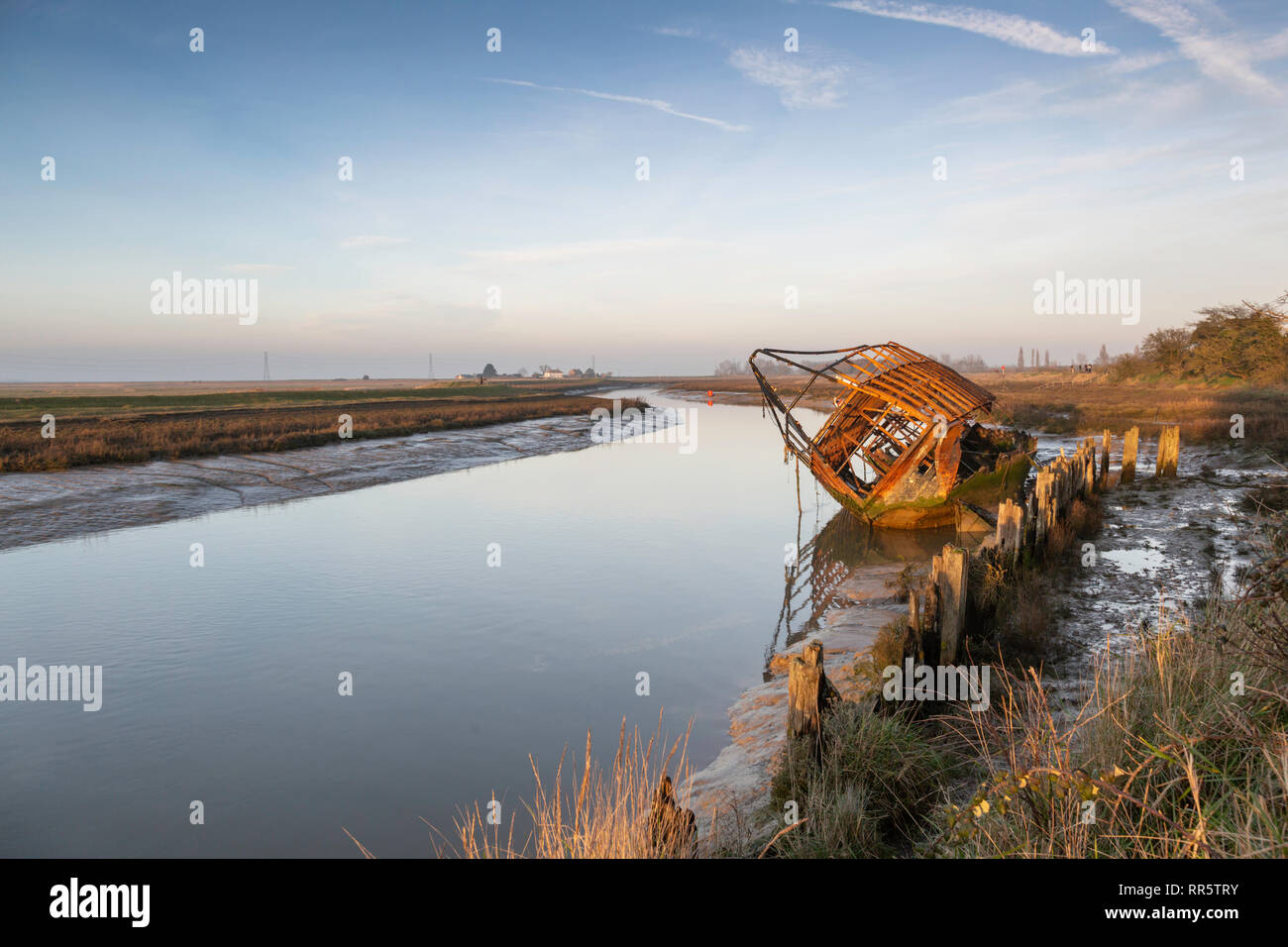 The wreck of the pirate ship in Faversham Creek during a late February afternoon. Stock Photo