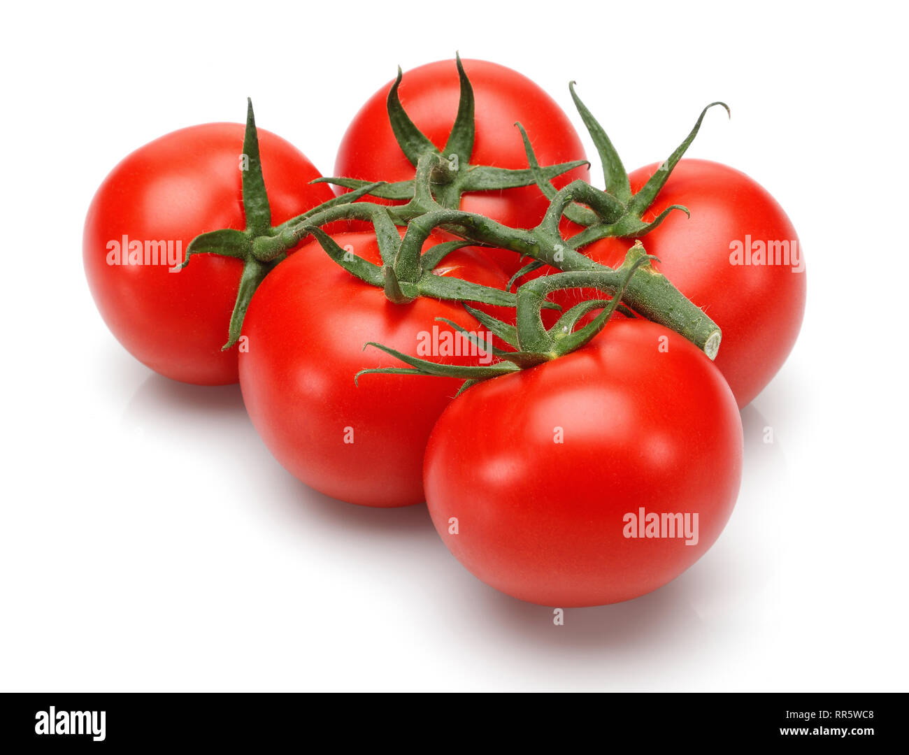 Fresh tomatoes isolated on white background Stock Photo - Alamy
