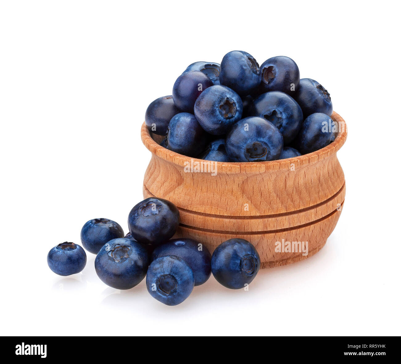 Blueberry isolated on white background. A pile of fresh blueberries in a wooden bowl Stock Photo