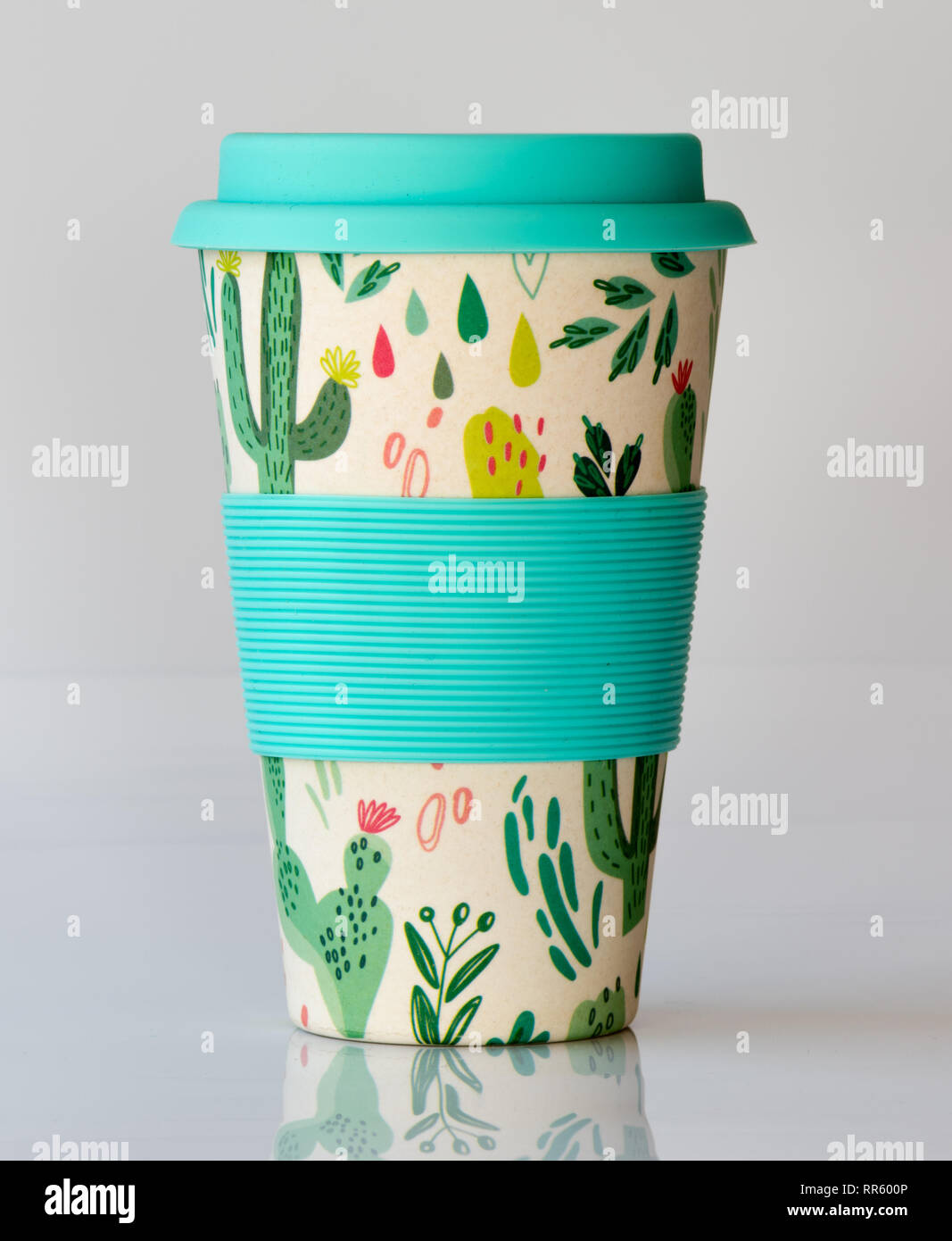 Reusable coffee cup made from natural material with silicone sleeve and lid for a sustainable environment Stock Photo