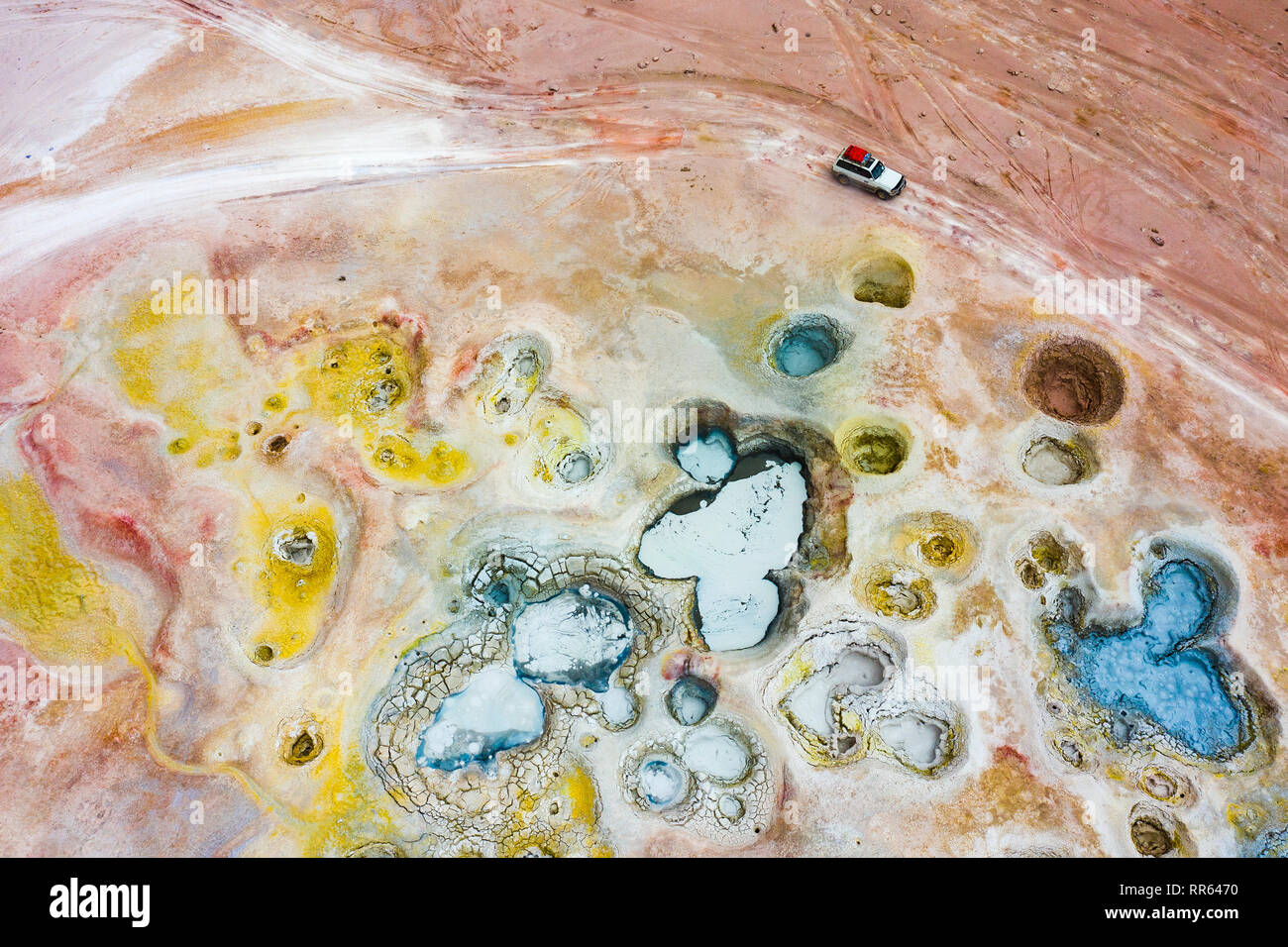 abstract colored blops of Geysir 'Sol de Mañana', province Potosi, Bolivia,aerial view. Vivid colors of geothermal aerea caused by volcanic minerals. Stock Photo