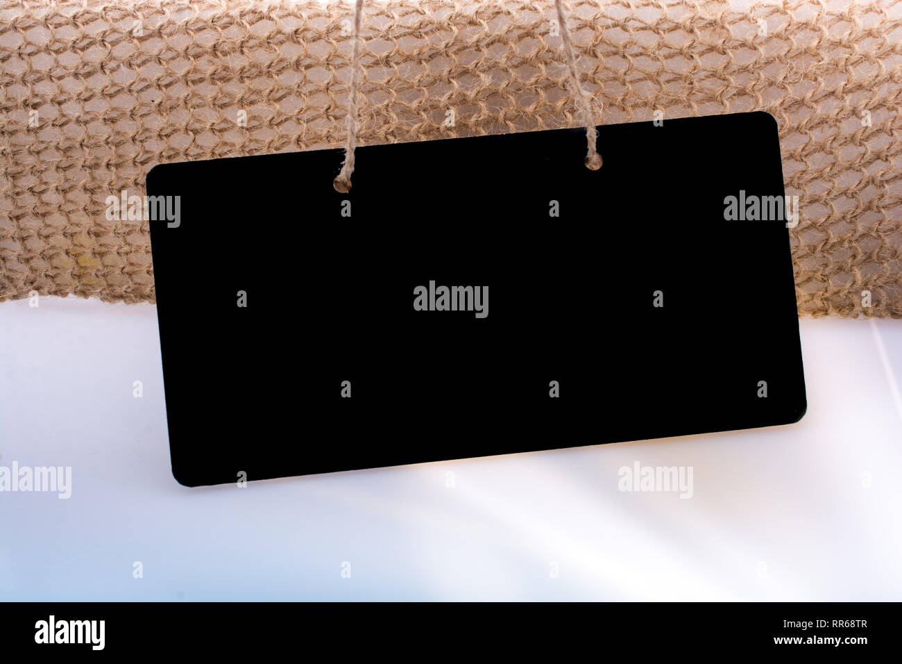 Rectangular shaped black notice board on white ground Stock Photo