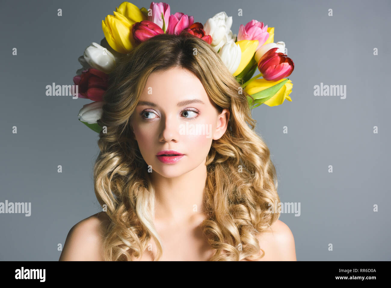 beautiful girl with wreath of flowers on hair isolated on grey Stock ...