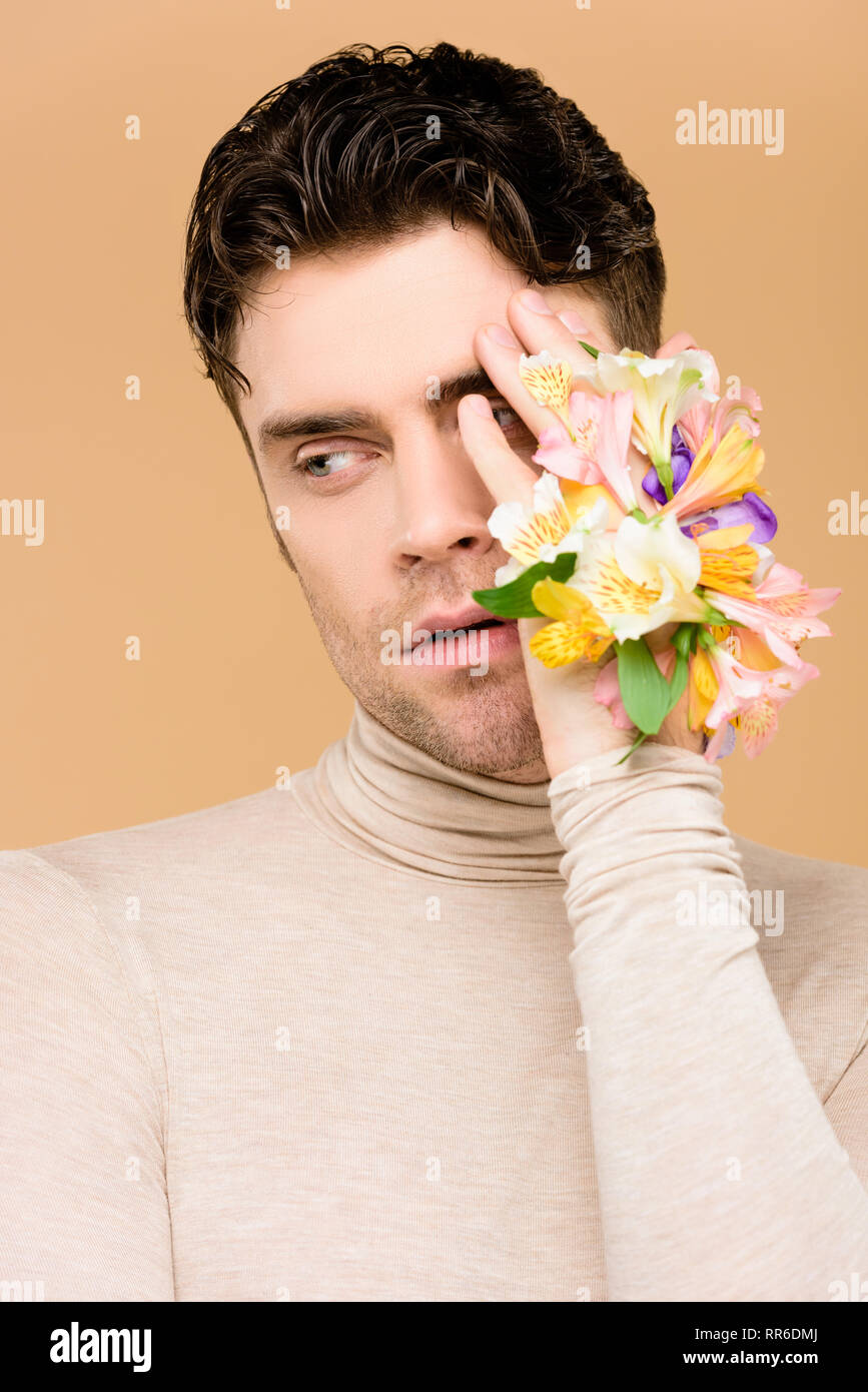 Portrait man covering one eye hi-res stock photography and images - Alamy