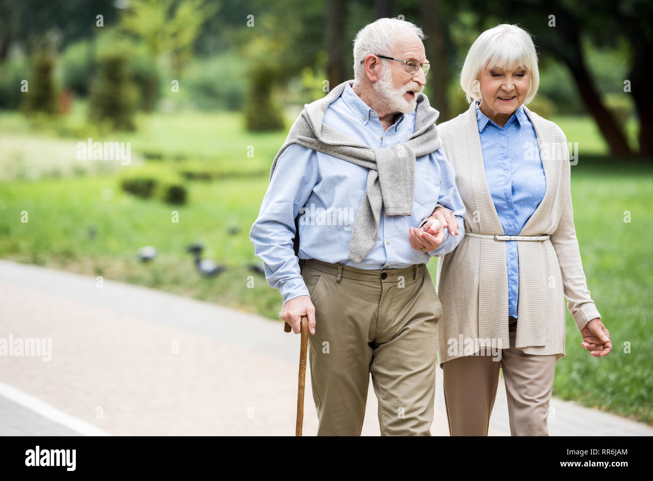 Man woman walking stick senior hi-res stock photography and images - Alamy