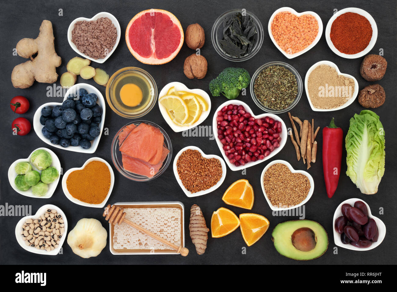 Super food to slow the ageing process concept including fish, fruit ...
