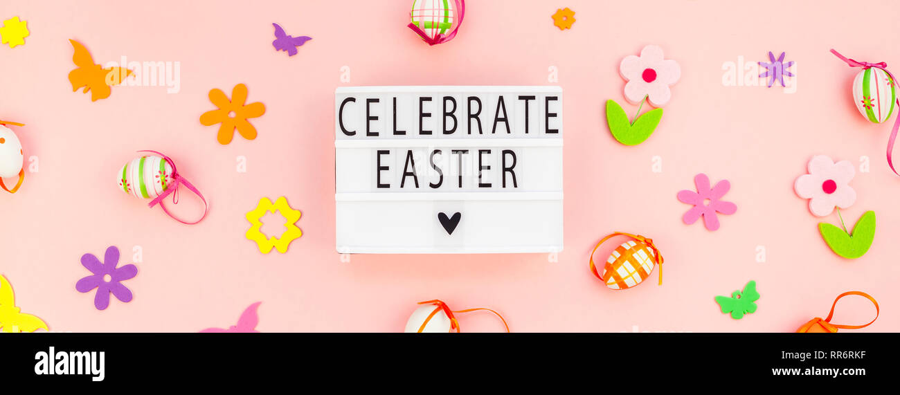 Creative Top view flat lay holiday composition Easter text on lightbox ...