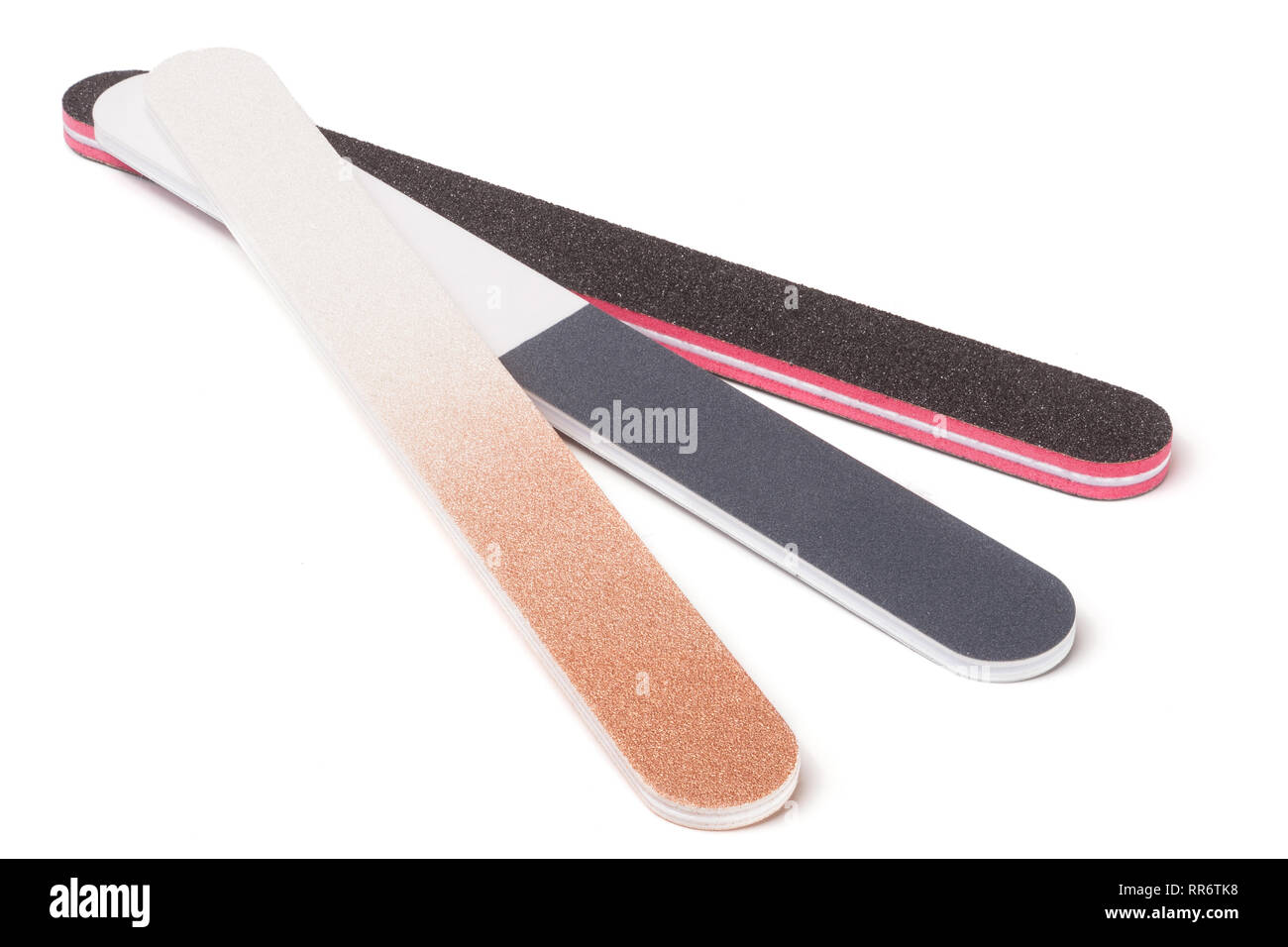 Three nail file with a different abrasive isolated on white background