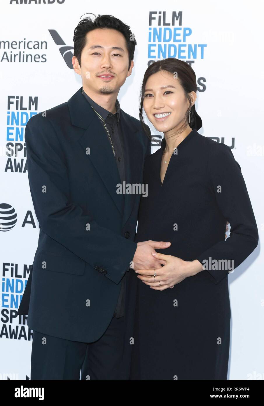 Steven Yeun and Joana Pak arrive at the Film Independent Spirit Awards