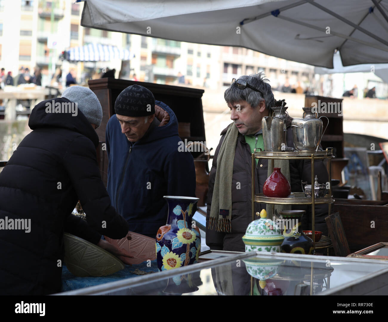 Milan, Italy. 24th Feb, 2019. People visit the antique market ...