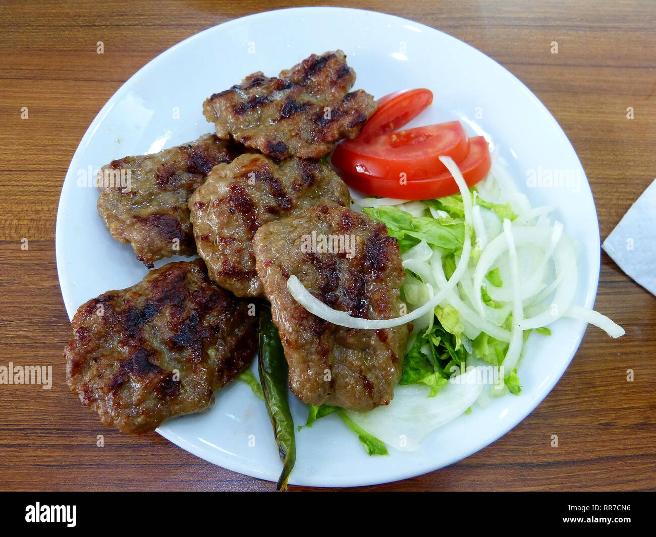 Turkish kofte meatballs with salad. Stock Photo