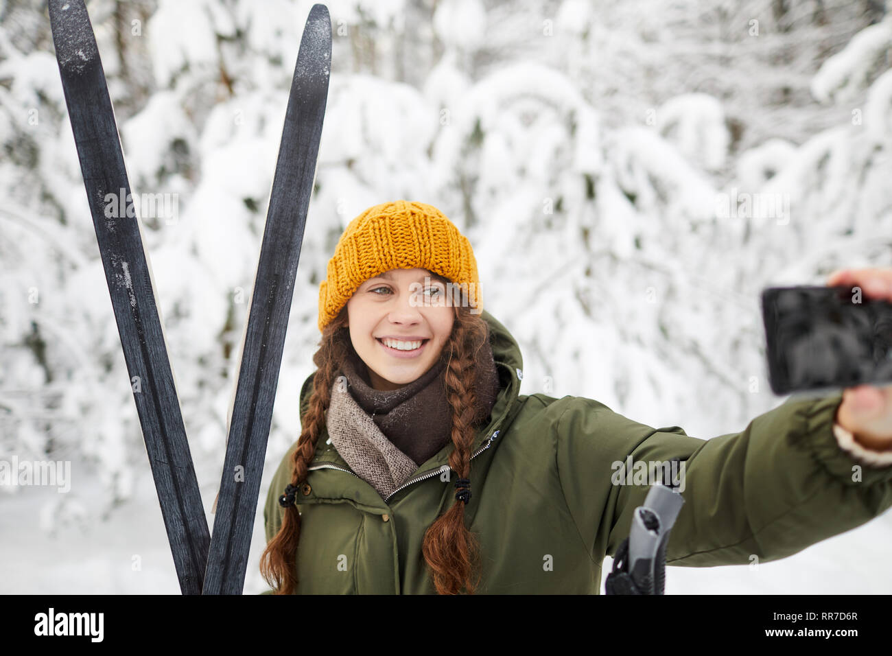 Woman Taking Selfie in Winter Park Stock Photo