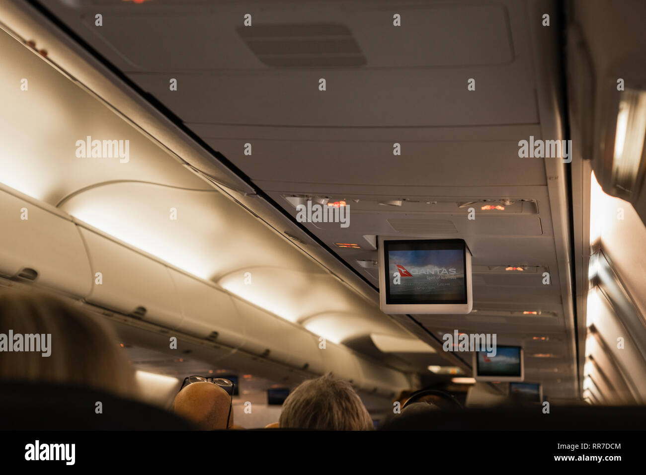 inside the plane as the Welcome Aboard message plays Stock Photo