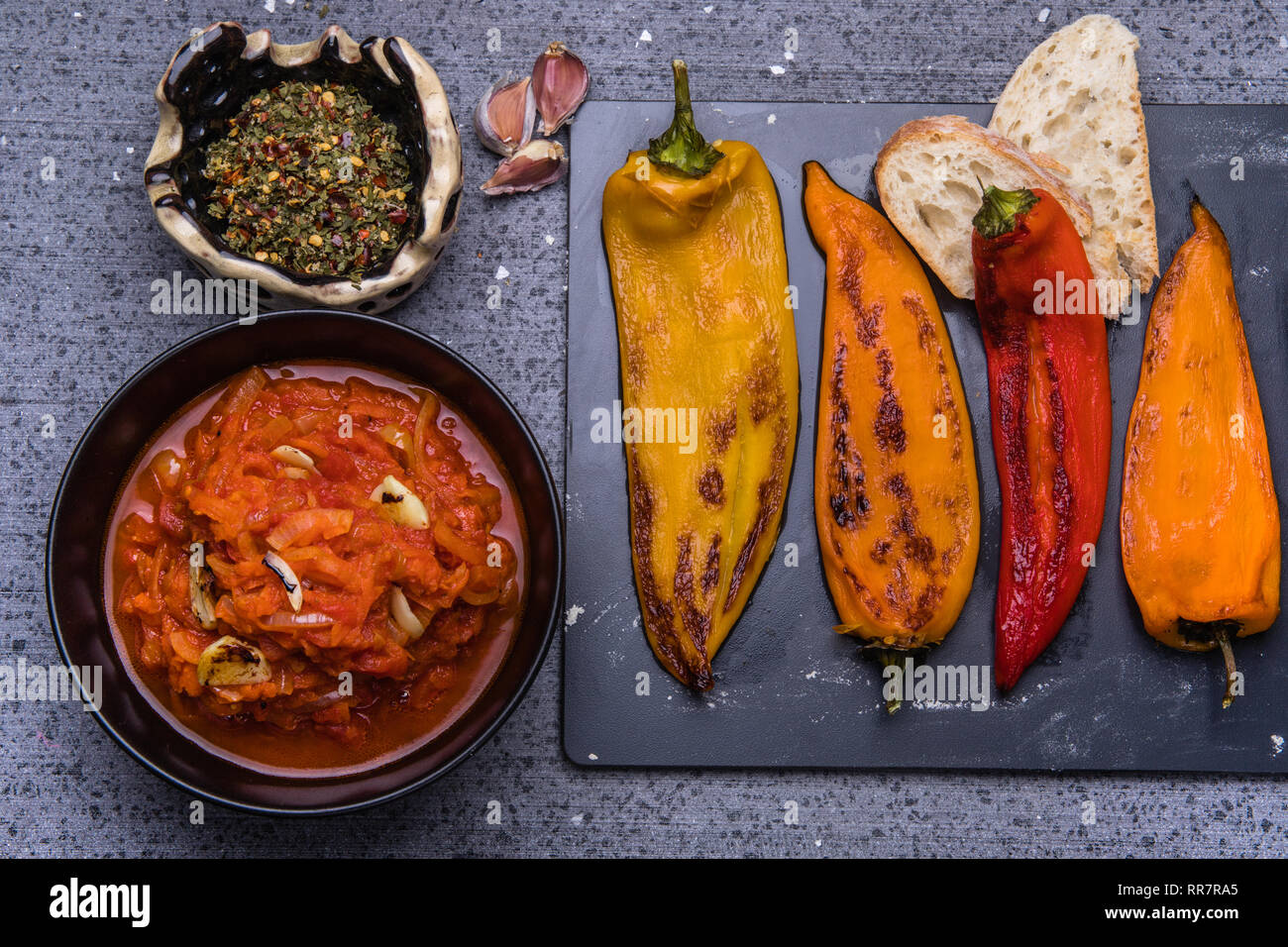 Grilled peppers with homemade tomato sauce and spices Stock Photo Alamy