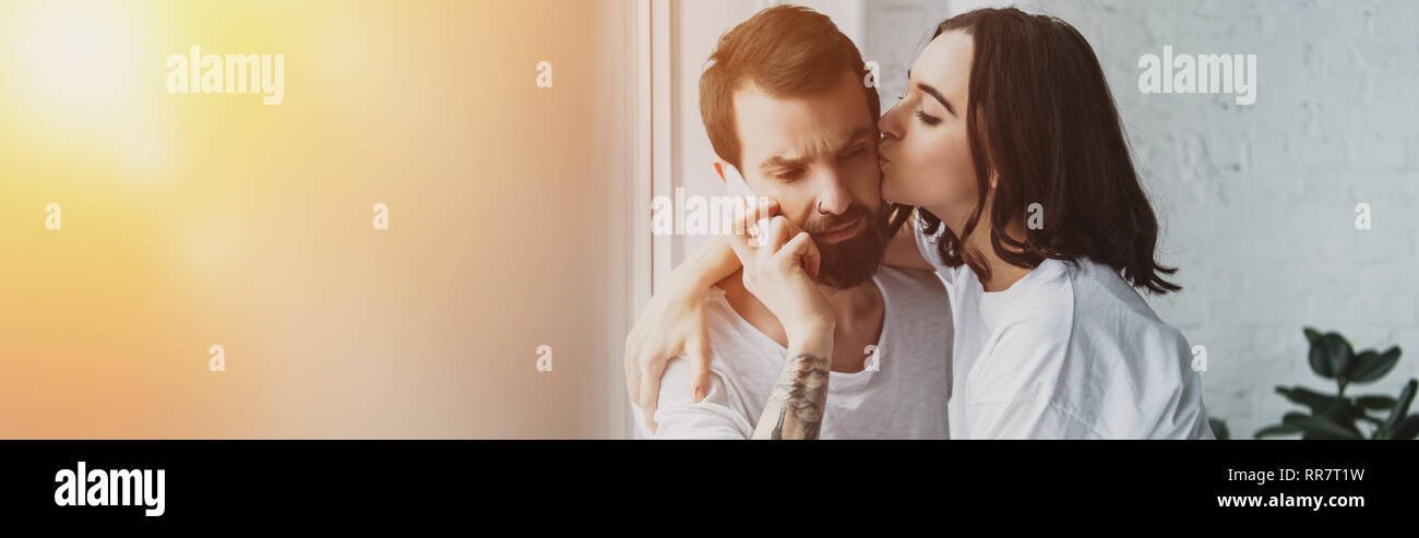 Beautiful woman kissing man hi-res stock photography and images - Alamy