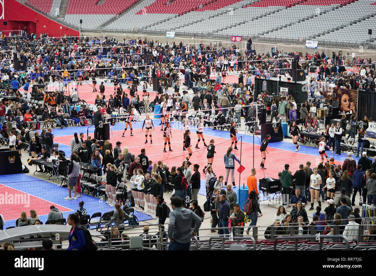 Courts are covered with female volleyball teams during a tournament in Courts are covered with female volleyball teams during a tournament in