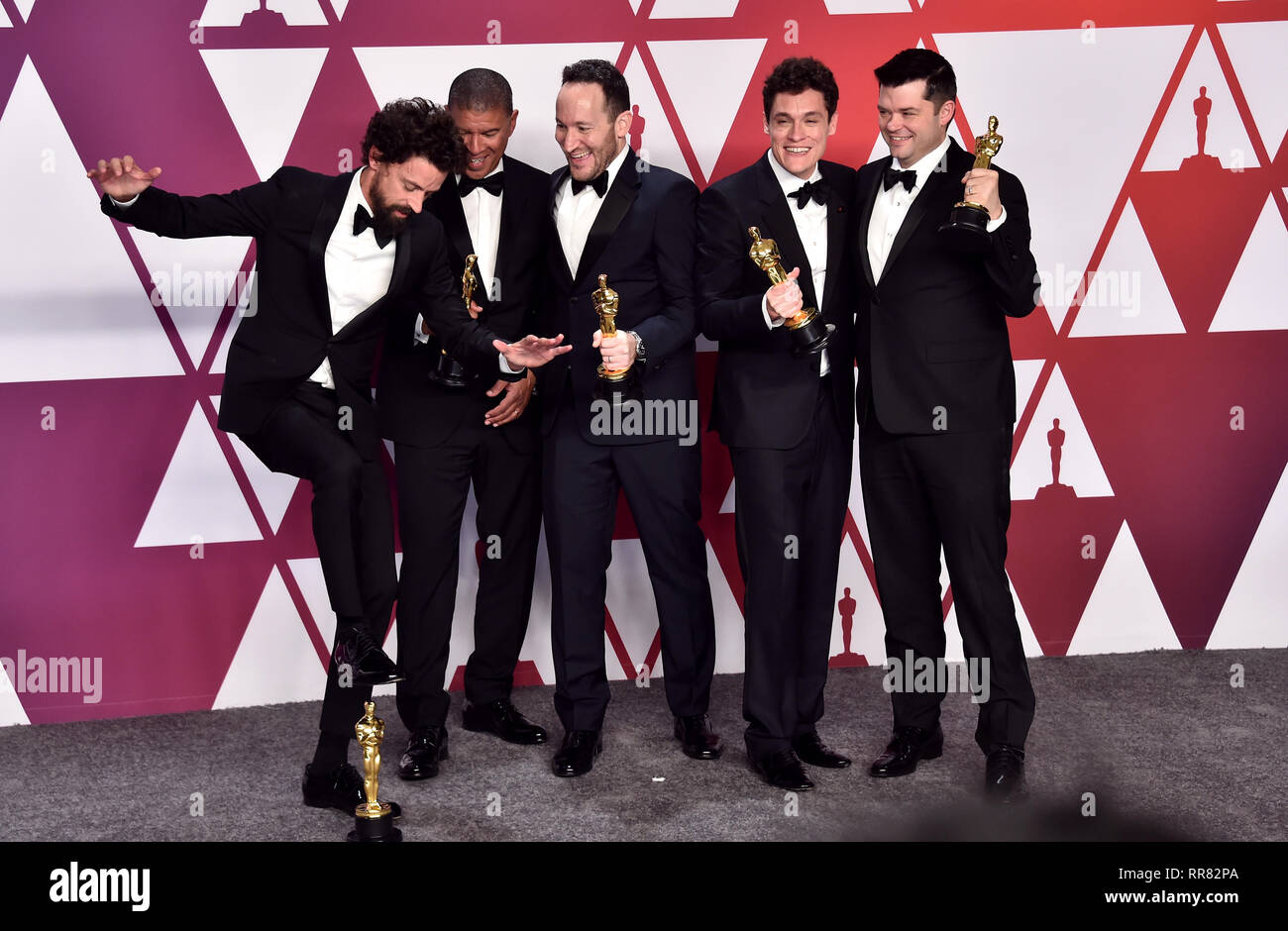 Bob Persichetti, Peter Ramsey, Rodney Rothman, Phil Lord, and Christopher Miller with their Oscars for best animated feature film for Spider-Man: Into The Spider-Verse in the press room at the 91st Academy Awards held at the Dolby Theatre in Hollywood, Los Angeles, USA. Stock Photo