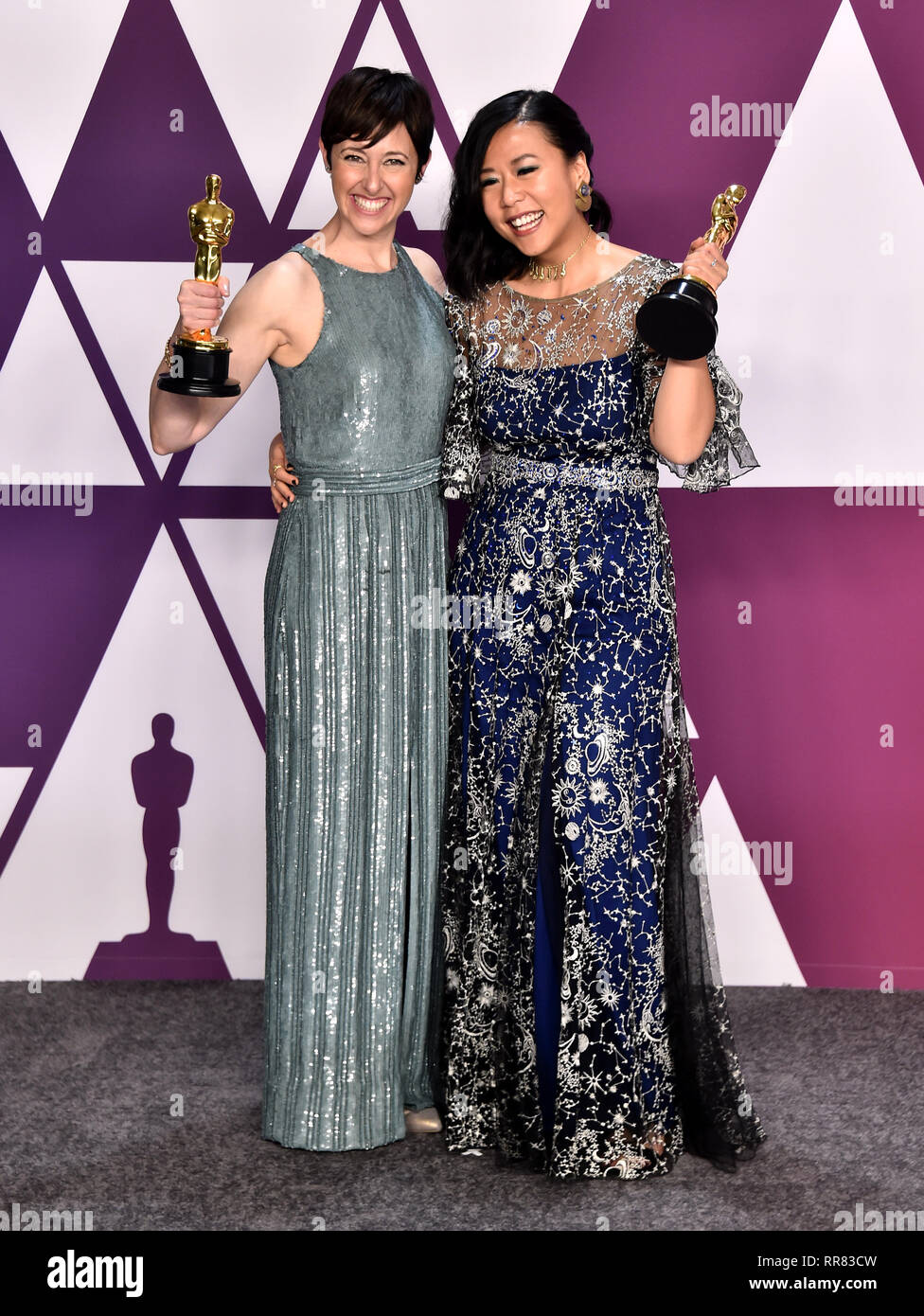 Becky Neiman-Cobb (left) and Domee She with the award for best short film (animated) for Bao in the press room at the 91st Academy Awards held at the Dolby Theatre in Hollywood, Los Angeles, USA. Stock Photo