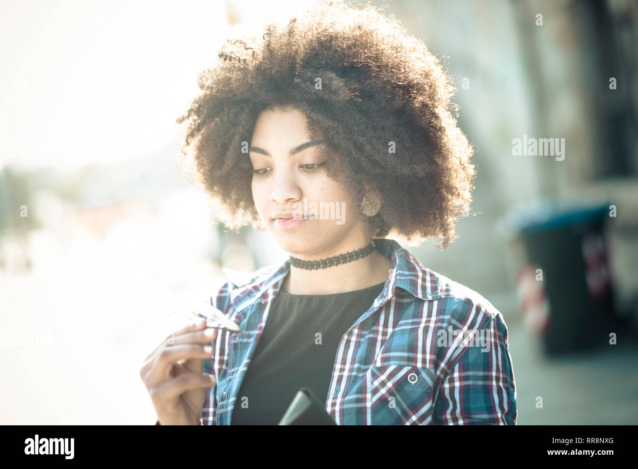 Cute Beautiful Brunette Curly Afro Hair Looking At The Camera And