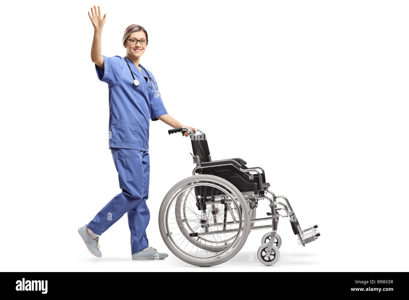 Nurse nursing stuff take care of dependend patient in wheelchair Stock  Photo - Alamy