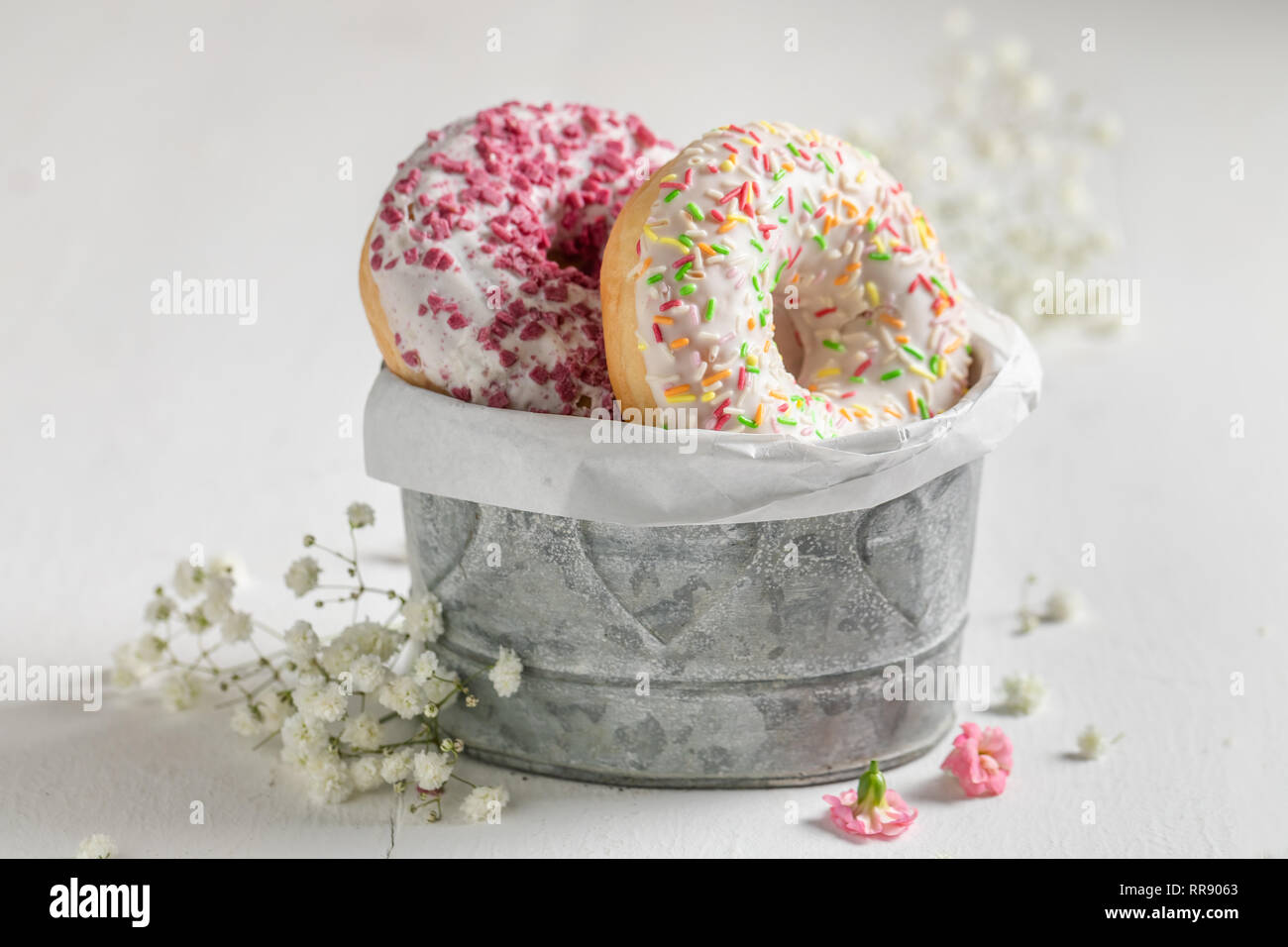 Yummy and fresh donuts with various types of toppings Stock Photo