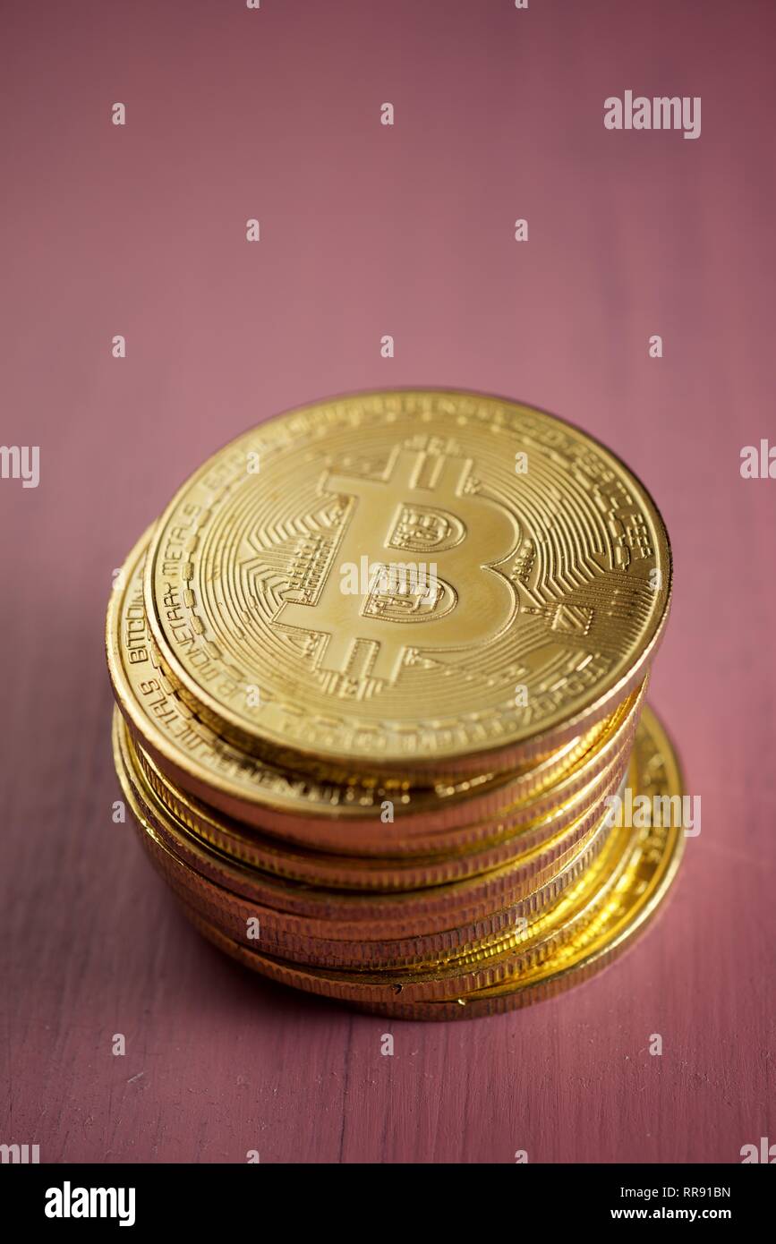 Bitcoins on a wood table. Stock Photo