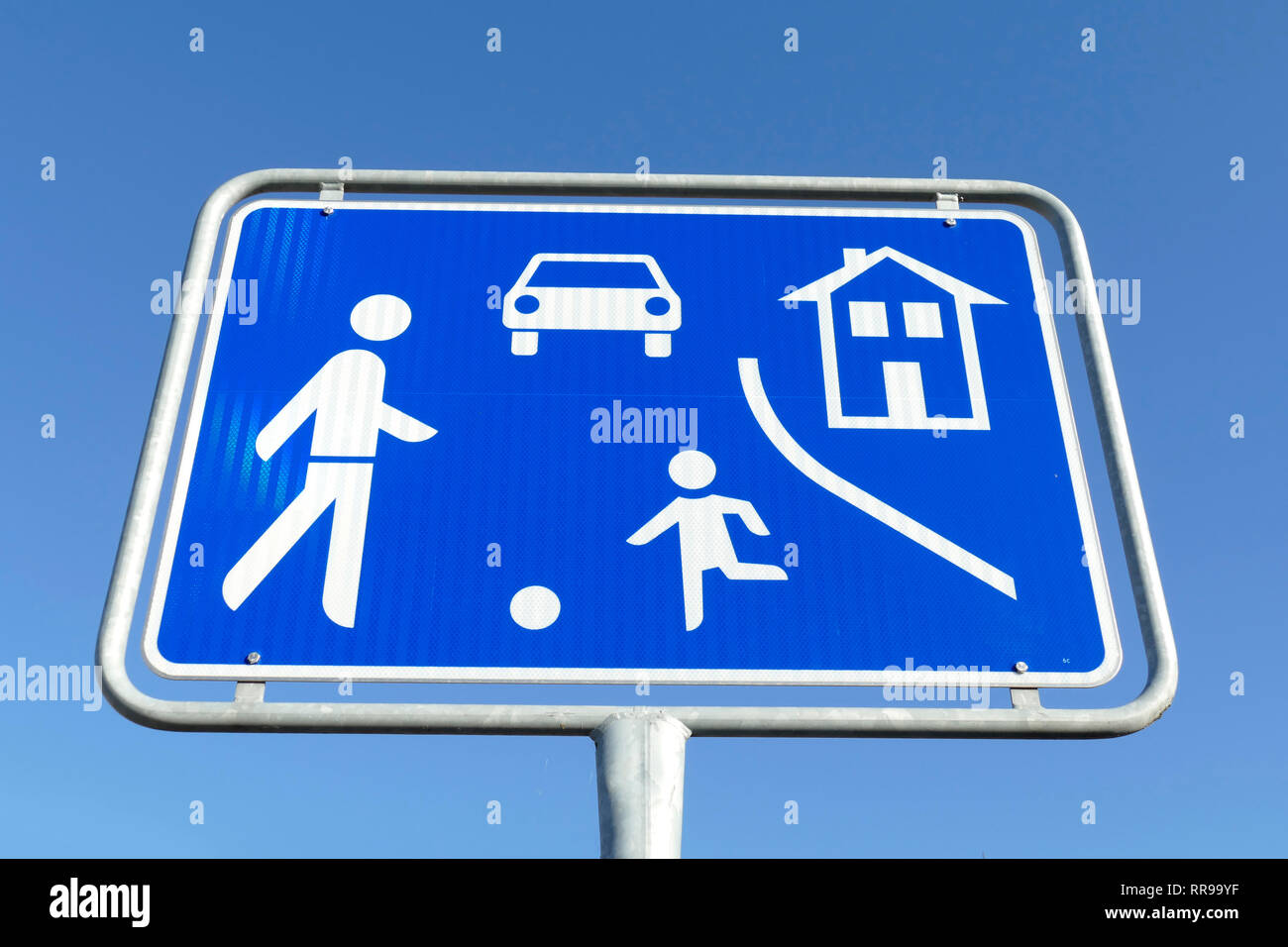 Road sign traffic calmed area, game road Stock Photo - Alamy