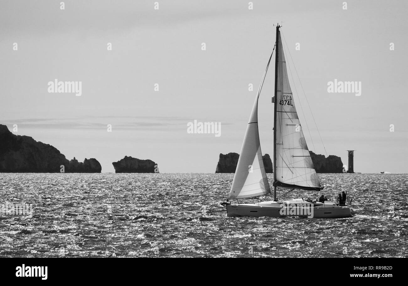 Sailing boat and The Needles from Hurst Castle, Lymington Stock Photo