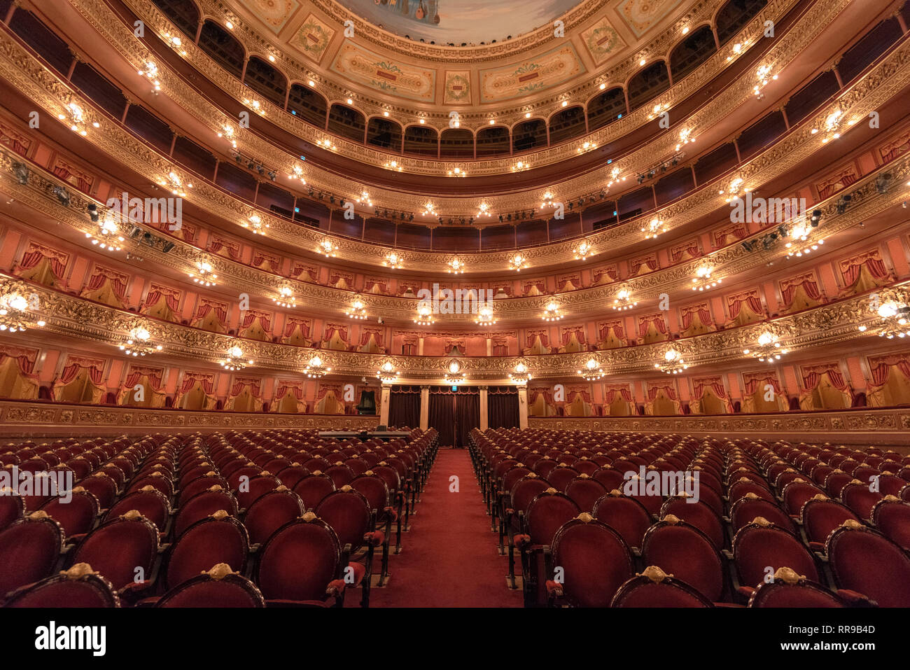 The interior of Teatro Colon in Buenos Aires, pictured from near the stage looking back towards the audience. Stock Photo