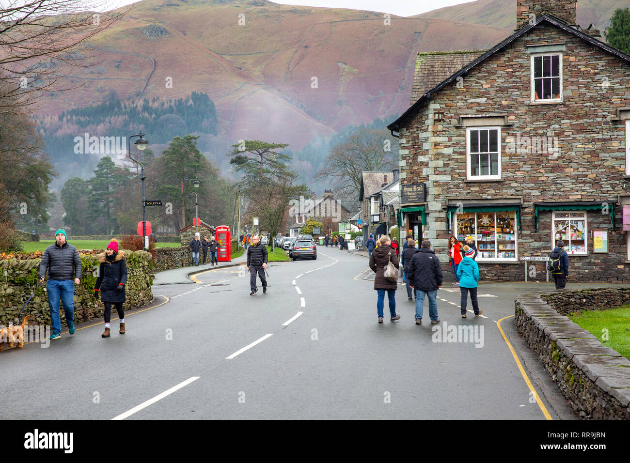 Walkers in Grasmere village on a chilly winters day, Grasmere,Lake