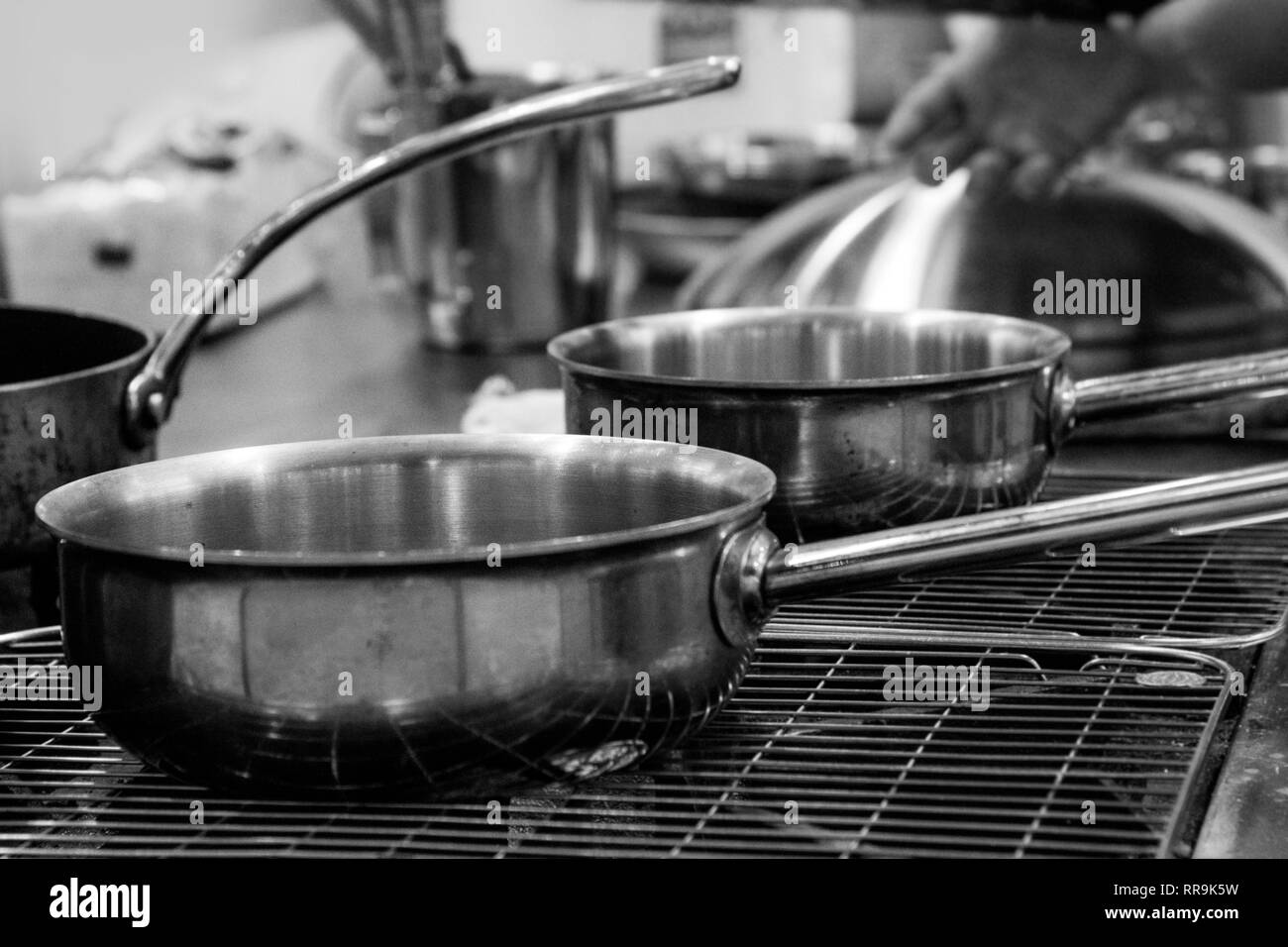 Stove Sink Cooking Utensils Countertop Stove Pots Pans White Wall Stock  Photo by ©Tverdohlib.com 195760896