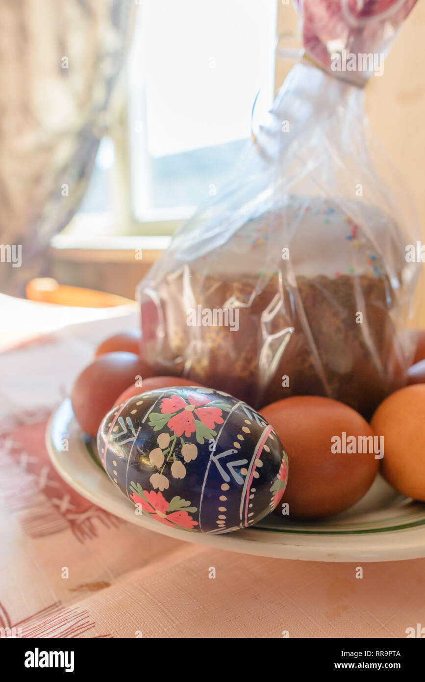 Easter egg, also known as pisanka, and Kulich cake are traditional food for Easter in the slavian countries like Russia, Ukraine or Poland Stock Photo