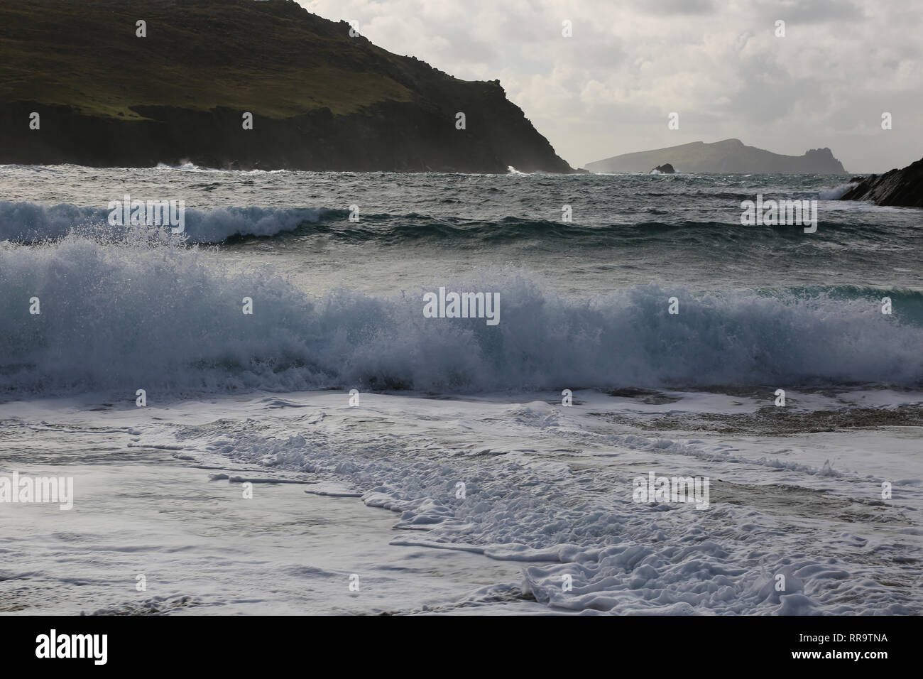 atlantic waves crashing onto narrow sea inlet, wild atlantic way ...