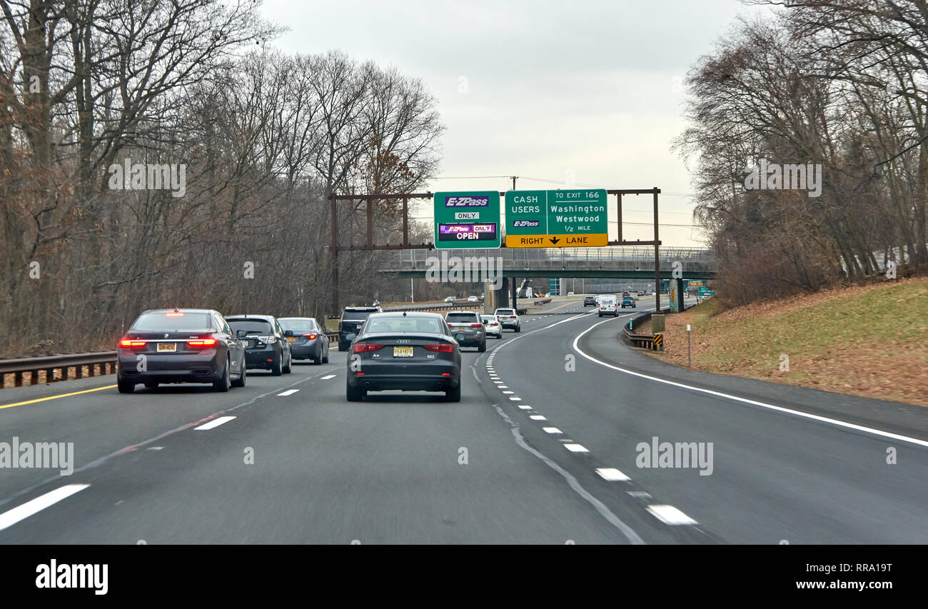 NEW YORK, USA - DECEMBER 14, 2018: EZPass signs and terminal. E ZPass is electronic toll collection system used on tolled roads, tunnels and bridges,  Stock Photo