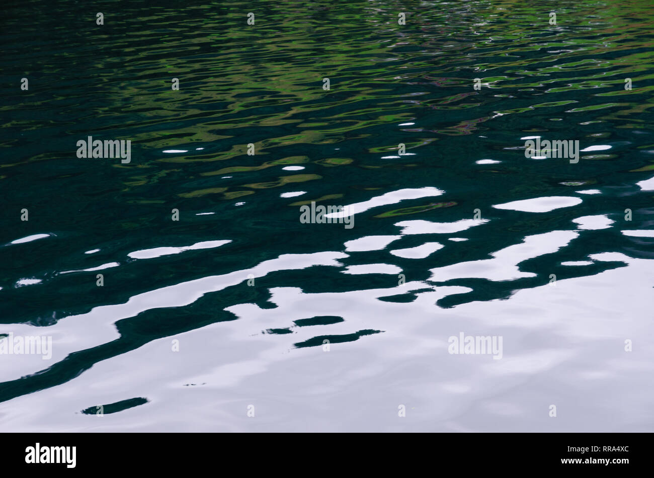 Water surface with specular highlights Stock Photo
