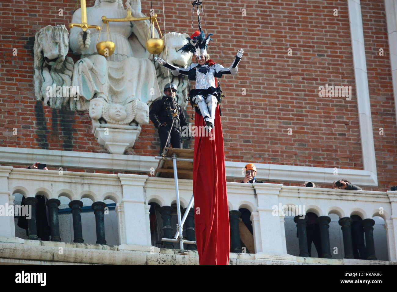 The exciting flight of the Angel of Carnival officially opens the Carnival celebrations in Piazza San Marco. Welcomed in the crowded parterre by the groups of historical reenactments in costume, it will melt the tension of the svolo in the embrace of the Doge and the audience, electrified by the spectacular show that always celebrates, even on national and international networks, the Venice Carnival. As usual, it will be the Maria winner of the 2018 Erika Chia Carnival to take on the role of the new Angel of the 2019 edition. Il Volo dell'Angelo will be preceded this year by the Flight of the  Stock Photo