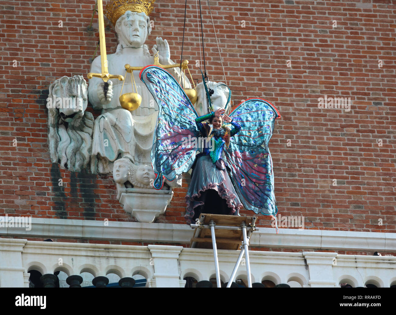 The exciting flight of the Angel of Carnival officially opens the Carnival celebrations in Piazza San Marco. Welcomed in the crowded parterre by the groups of historical reenactments in costume, it will melt the tension of the svolo in the embrace of the Doge and the audience, electrified by the spectacular show that always celebrates, even on national and international networks, the Venice Carnival. As usual, it will be the Maria winner of the 2018 Erika Chia Carnival to take on the role of the new Angel of the 2019 edition. Il Volo dell'Angelo will be preceded this year by the Flight of the  Stock Photo