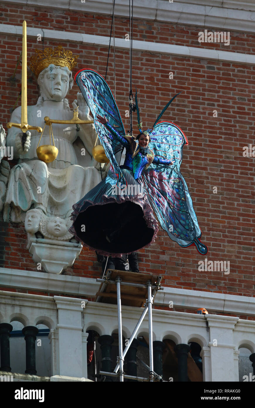 The exciting flight of the Angel of Carnival officially opens the Carnival celebrations in Piazza San Marco. Welcomed in the crowded parterre by the groups of historical reenactments in costume, it will melt the tension of the svolo in the embrace of the Doge and the audience, electrified by the spectacular show that always celebrates, even on national and international networks, the Venice Carnival. As usual, it will be the Maria winner of the 2018 Erika Chia Carnival to take on the role of the new Angel of the 2019 edition. Il Volo dell'Angelo will be preceded this year by the Flight of the  Stock Photo