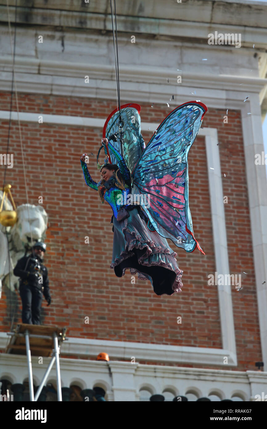 The exciting flight of the Angel of Carnival officially opens the Carnival celebrations in Piazza San Marco. Welcomed in the crowded parterre by the groups of historical reenactments in costume, it will melt the tension of the svolo in the embrace of the Doge and the audience, electrified by the spectacular show that always celebrates, even on national and international networks, the Venice Carnival. As usual, it will be the Maria winner of the 2018 Erika Chia Carnival to take on the role of the new Angel of the 2019 edition. Il Volo dell'Angelo will be preceded this year by the Flight of the  Stock Photo