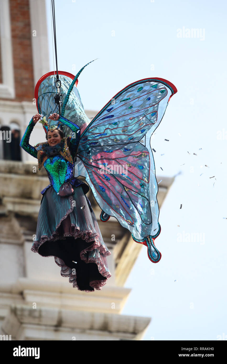 The exciting flight of the Angel of Carnival officially opens the Carnival celebrations in Piazza San Marco. Welcomed in the crowded parterre by the groups of historical reenactments in costume, it will melt the tension of the svolo in the embrace of the Doge and the audience, electrified by the spectacular show that always celebrates, even on national and international networks, the Venice Carnival. As usual, it will be the Maria winner of the 2018 Erika Chia Carnival to take on the role of the new Angel of the 2019 edition. Il Volo dell'Angelo will be preceded this year by the Flight of the  Stock Photo