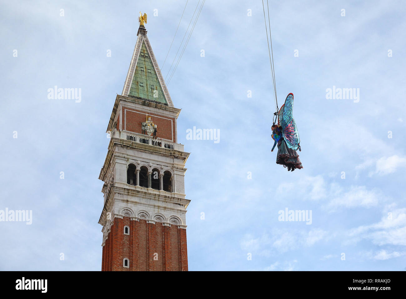 The exciting flight of the Angel of Carnival officially opens the Carnival celebrations in Piazza San Marco. Welcomed in the crowded parterre by the groups of historical reenactments in costume, it will melt the tension of the svolo in the embrace of the Doge and the audience, electrified by the spectacular show that always celebrates, even on national and international networks, the Venice Carnival. As usual, it will be the Maria winner of the 2018 Erika Chia Carnival to take on the role of the new Angel of the 2019 edition. Il Volo dell'Angelo will be preceded this year by the Flight of the  Stock Photo