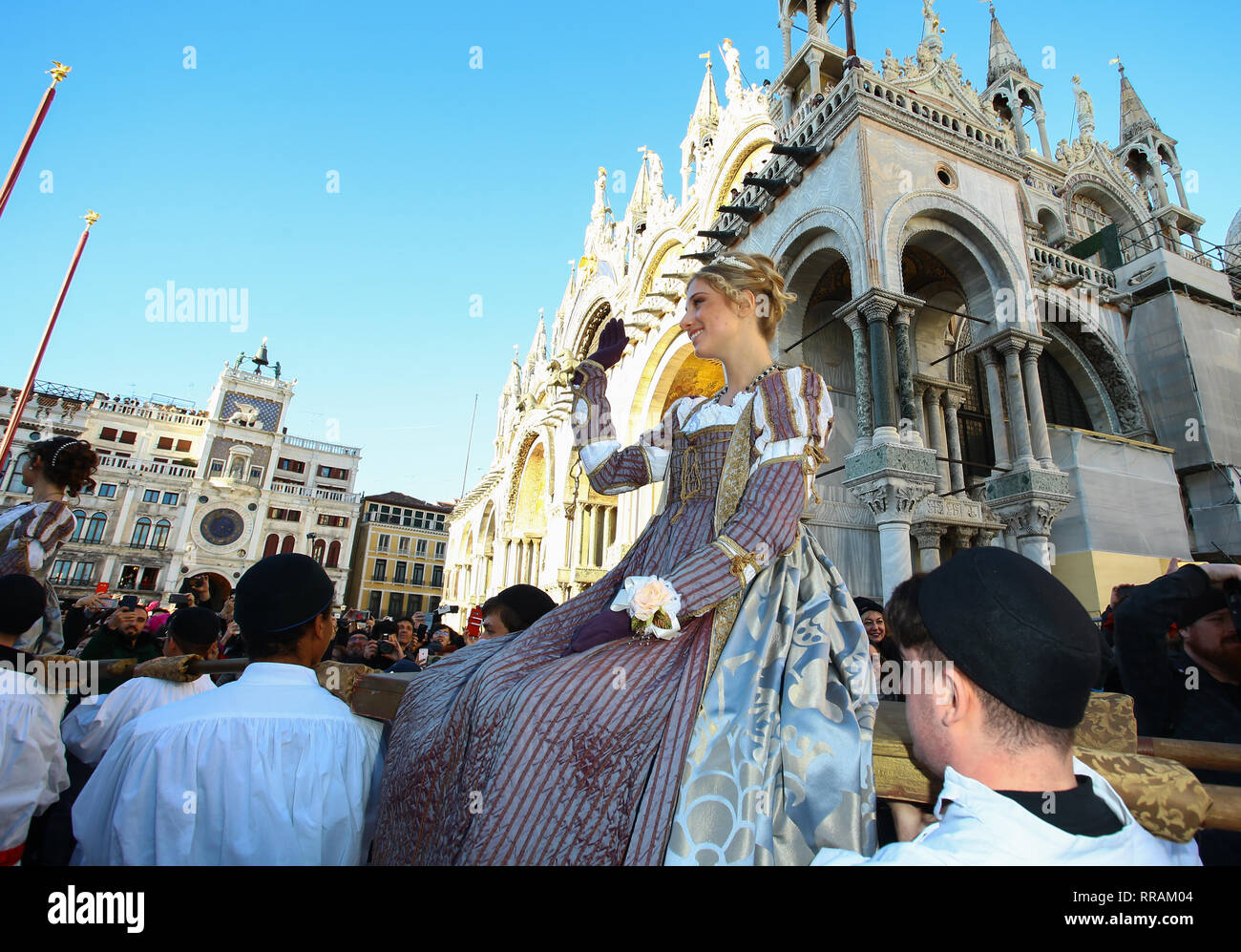 Venice, Italy. 23rd Feb, 2019. The homage that the Doge brought annually to twelve beautiful Venetian girls, giving them generously for the marriage with the dogali jewels has been renewed today with the 'Festa delle Marie', an appointment of the Venetian tradition. The event started in the early afternoon with the girls' parade, accompanied by historical costumed groups, from San Piero di Castello along Riva degli Schiavoni to the stage of Piazza San Marco where the official presentation of the Carnival from part of Prince Maurice Agosti. Credit: Independent Photo Agency/Alamy Live News Stock Photo