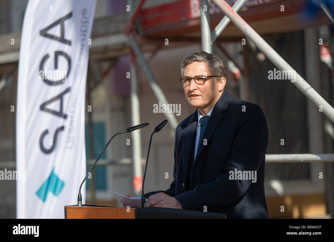 Hamburg, Germany. 25th Feb, 2019. Thomas Krebs, Spokesman of the Management Board of the SAGA Group, speaks for 182 eight-euro apartments at a topping-out ceremony for SAGA. Credit: Daniel Reinhardt/dpa/Alamy Live News Stock Photo