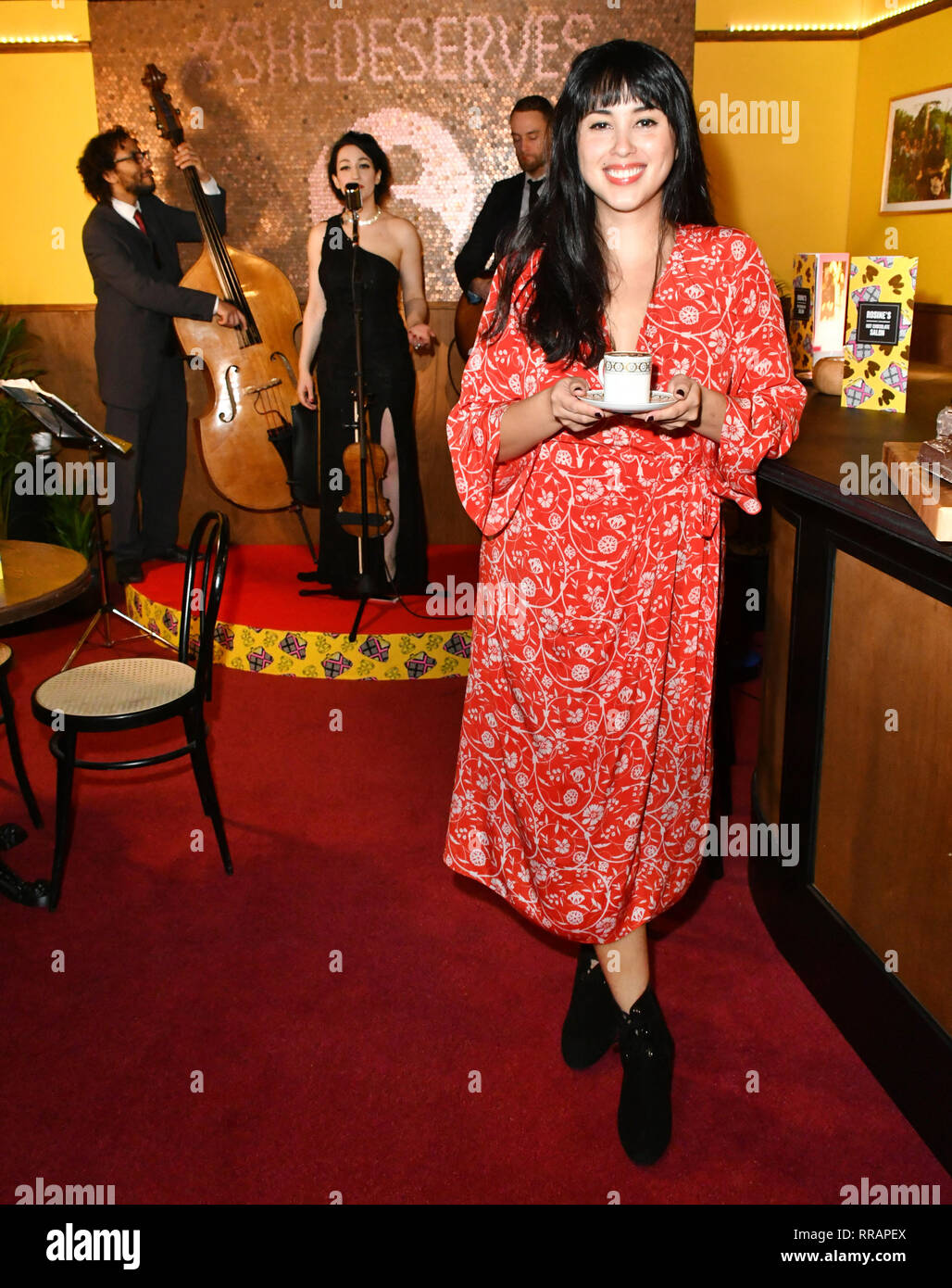 London, UK. 25th Feb 2019. Melissa Hemsley, chefs and influencers mark  launch of hot chocolate salon, hidden behind a secret door in Rosine's  newsagents in Shoreditch, which opens to mark the start