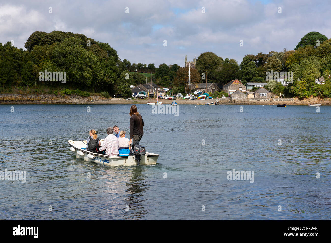 LIZARD, UK - SEPTEMBER 17, 2018: A small passenger ferry carrys walkers across Gillan Creek from Gillan to St Anthony-in-Meneage in Cornwall. Stock Photo