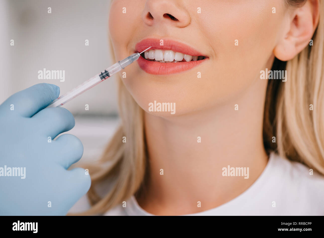 cropped view of dentist giving local anesthesia injection to woman Stock Photo Alamy