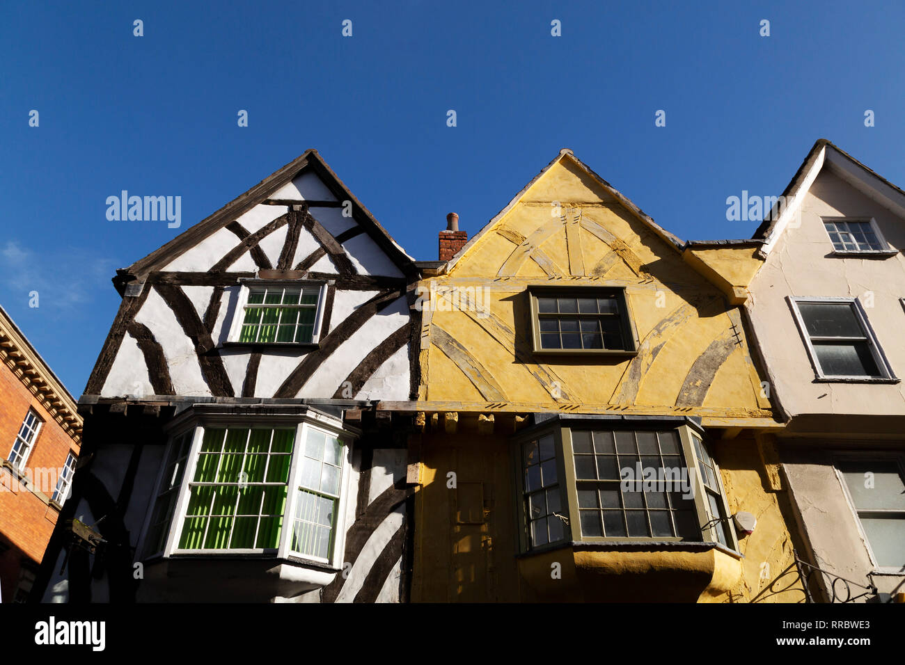 The facade of half-timbered houses on Davygate in central York, England. The timbers of the medieval buildings can be seen. Stock Photo