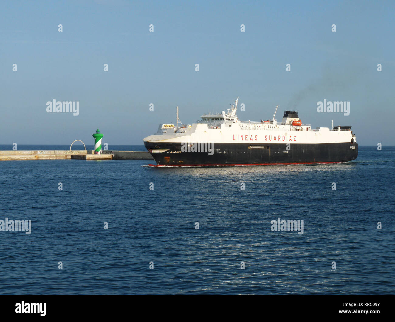 Merchant ship L'Audace entering the port of Barcelona. March 23, 2018. Stock Photo