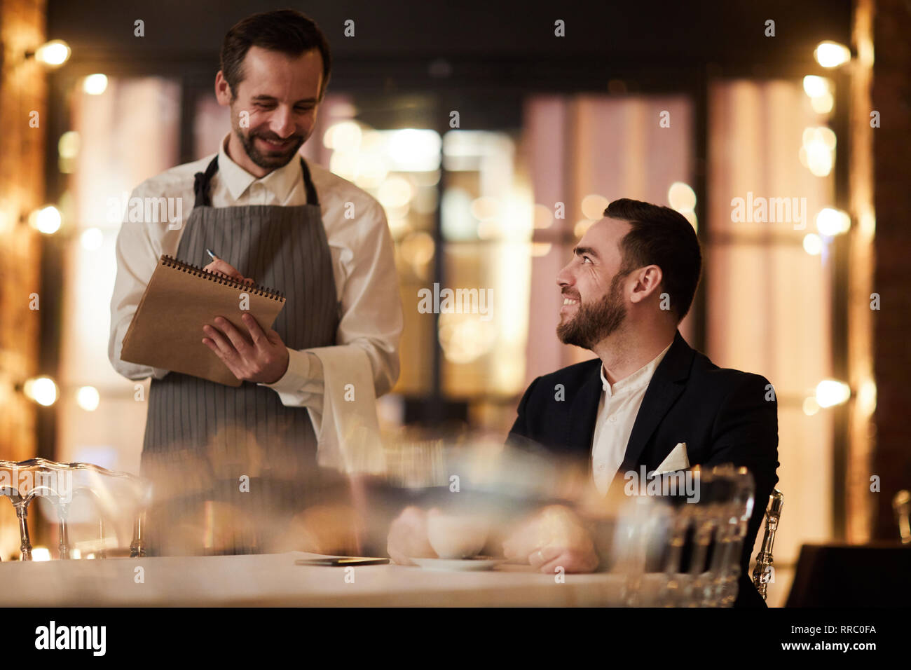 Guest Ordering Food in Restaurant Stock Photo Alamy