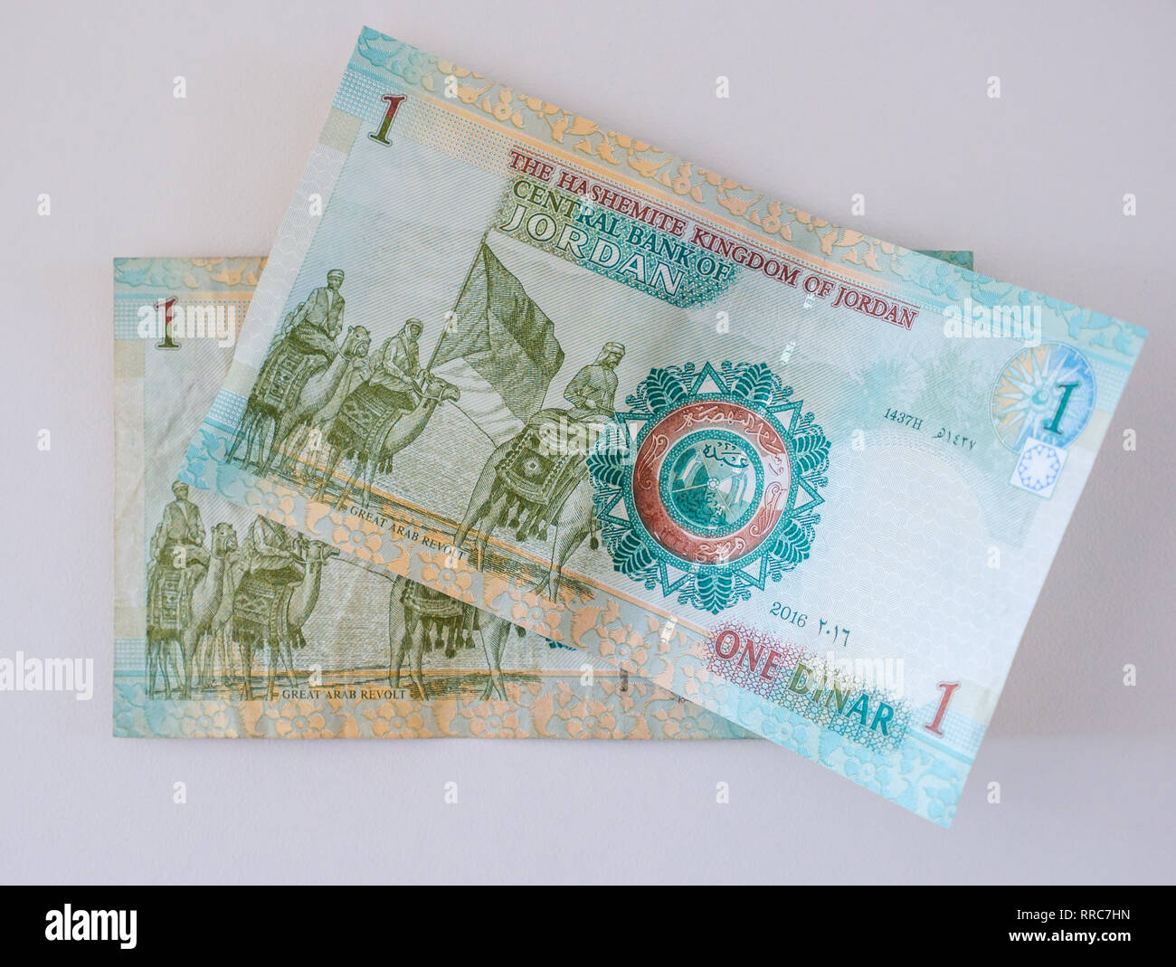 Foreign money banknotes; Jordanian Dinar, 1 Dinar notes with Great Arab Revolt (1916) Hashemite Kingdom of Jordan Stock Photo